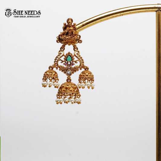 “Gold-plated chandbali jhumka earrings with traditional design for women”