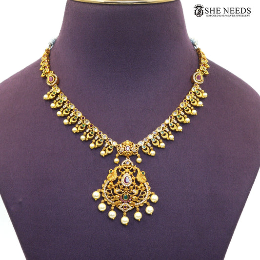 Close-up view of antique gold pearl and ruby stone double layer necklace with intricate stone detailing|She Needs Jewellery