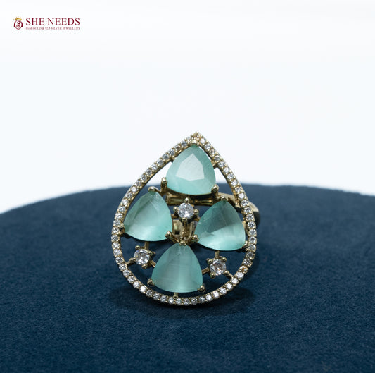 Antique gold teardrop statement ring with CZ stones and pastel Light Blue mint stones