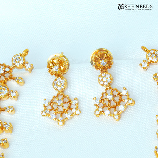 Aurelia Bloom white floral drop earrings with sparkling white stones and gold finish|She Needs Jewellery