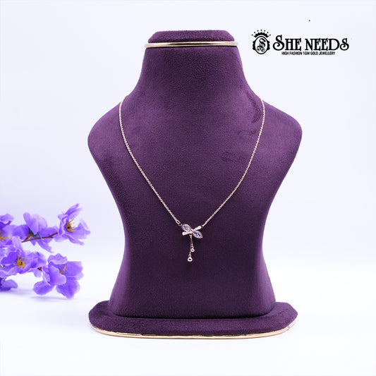 Rose gold Crystal Petal pendant chain featuring marquise-cut crystal stones in a floral design with delicate dangling accents on a fine chain, displayed on a purple jewelry bust |She Needs Jewellery