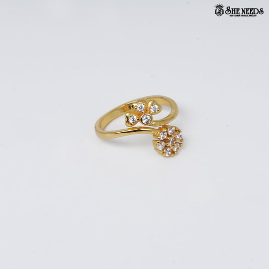 Gold-plated adjustable open ring featuring dual floral cubic zirconia clusters connected by an elegant crossover band on a white background.
|She Needs Jewellery