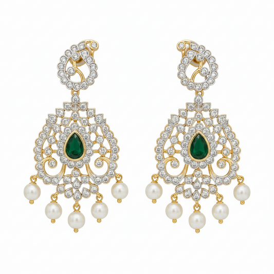Luxury emerald green American diamond bridal necklace set with pearl drop earrings in gold finish displayed on beige mannequin.