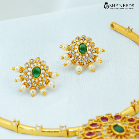 Gold-plated green stone ruby-tone drop earrings with American Diamond stones and pearl detailing|She Needs Jewellery