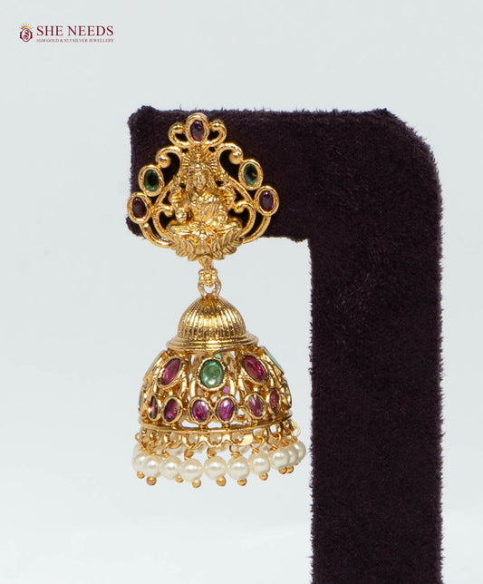 Gold Plated Temple Lakshmi Jhumka Earrings with Multicolor Stones, Pearl Drops and Lakshmi Design | She Needs Jewellery