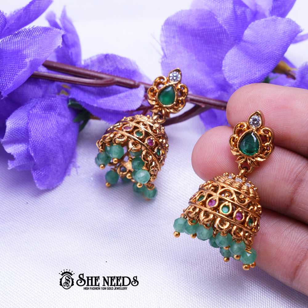 Mayura Antique Gold Jhumka Earrings with Green Stone & Ruby Beads | Festive Wear