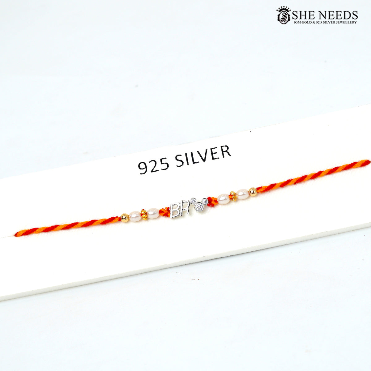 925 Silver Rakhi with Red & Yellow Thread, Pearl Beads & BRo Charm