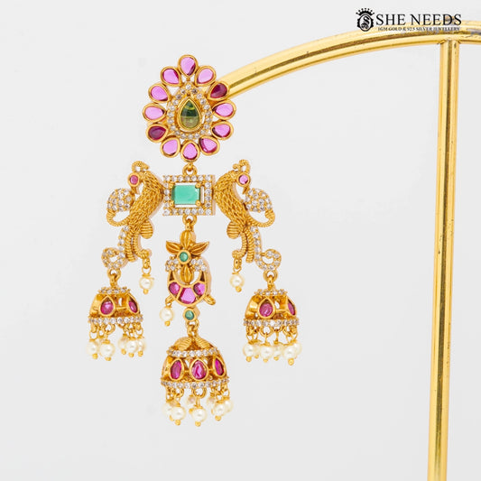 Traditional peacock chandbali earrings with ruby, emerald stones and pearl drops – She Needs Jewellery