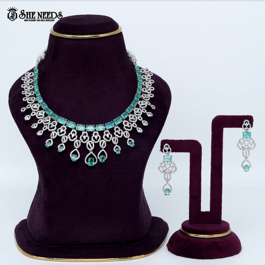 Majestic loop crest rhodium silver statement necklace with cascading drop design