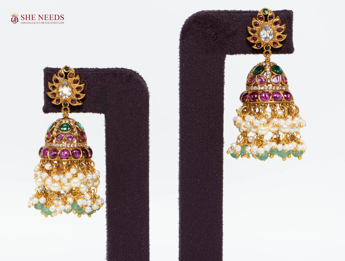 Regal Emerald Pearl Tassel Jhumka Earrings
