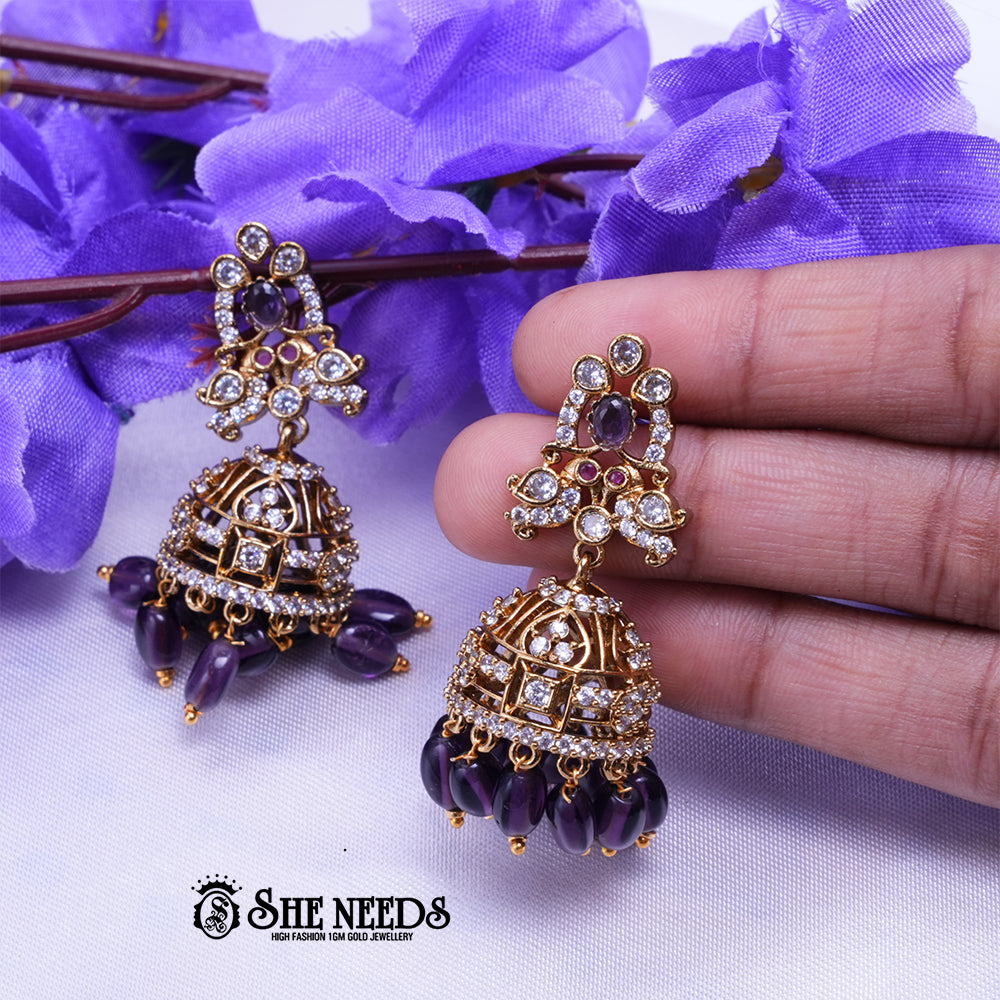 Aarika Antique Gold CZ Stone Jhumka Earrings with Bead Drops | Premium Festive Wear