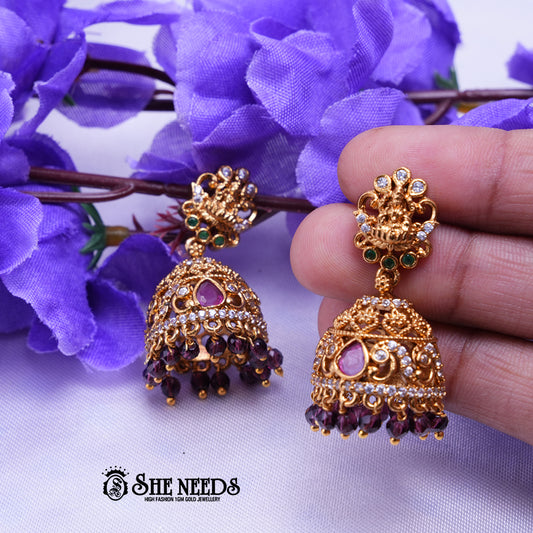 Antique gold temple jhumka earrings with CZ stones and bead drops for women