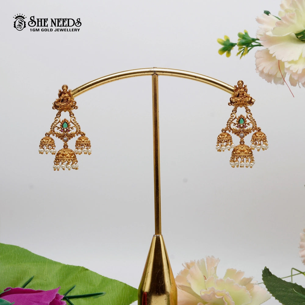 “Gold-plated chandbali jhumka earrings with traditional design for women”