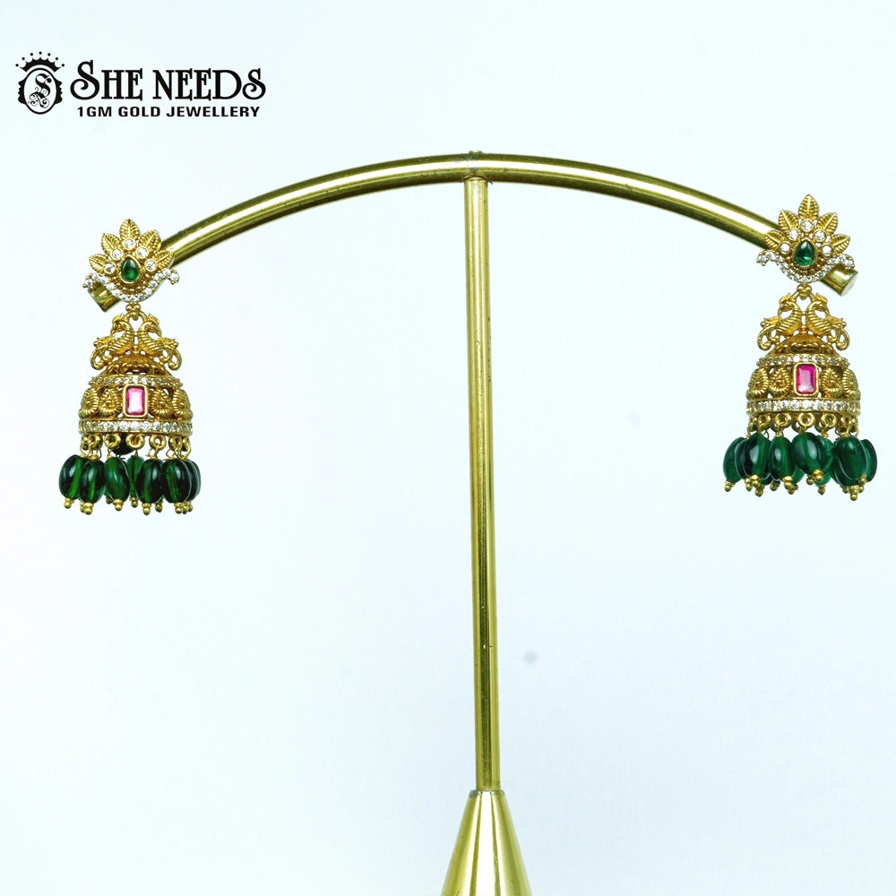 Gold plated green bead jhumkas with Green stone traditional earrings for women
