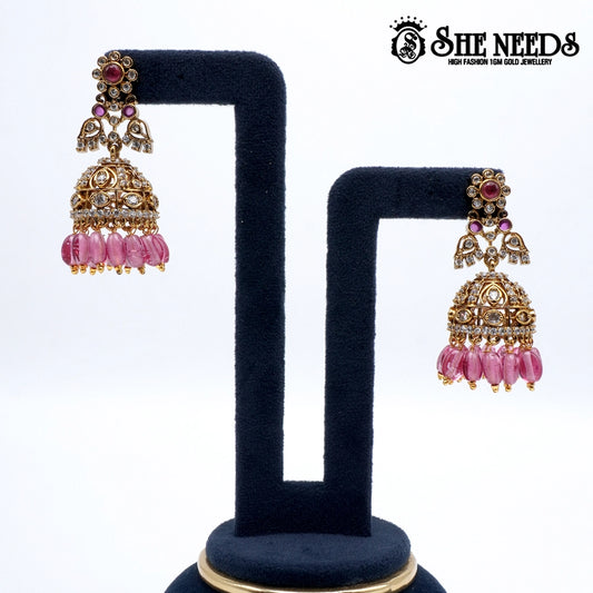 Gold plated pink bead jhumkas traditional earrings for women