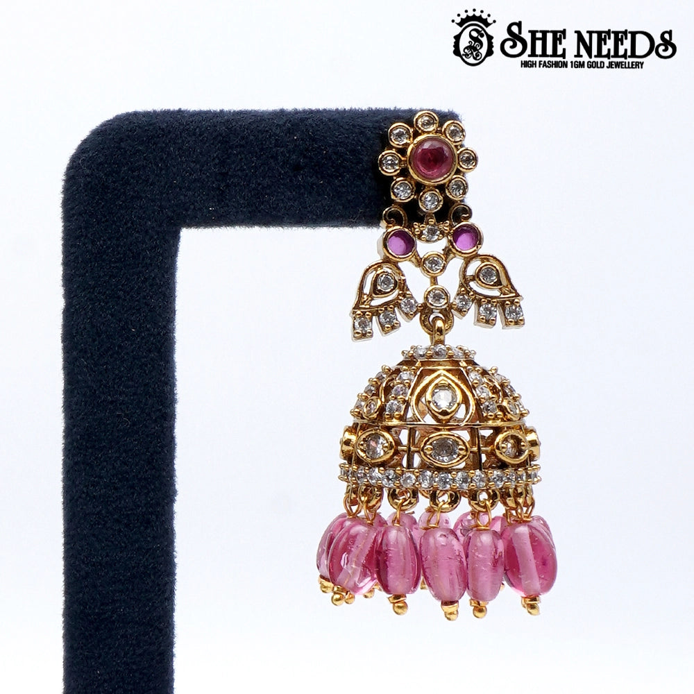 Gold plated pink bead jhumkas traditional earrings for women