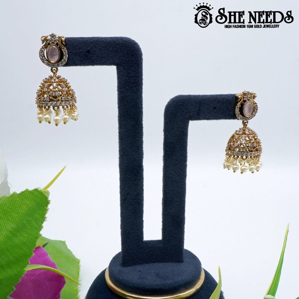 Oval stone temple jhumka earrings with pearl drops- sheneedsjewellery