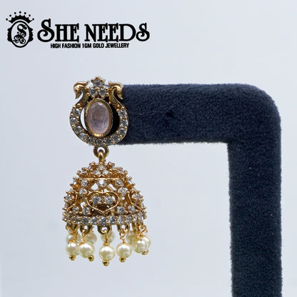 Oval stone temple jhumka earrings with pearl drops- sheneedsjewellery