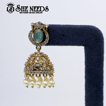 Oval stone temple jhumka earrings with pearl drops- sheneedsjewellery