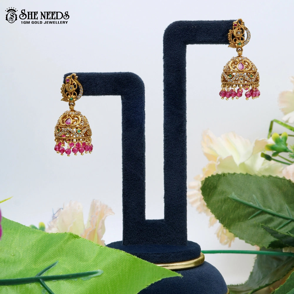 Peacock motif temple jhumka earrings with emerald pink drops – sheneeds jewellery