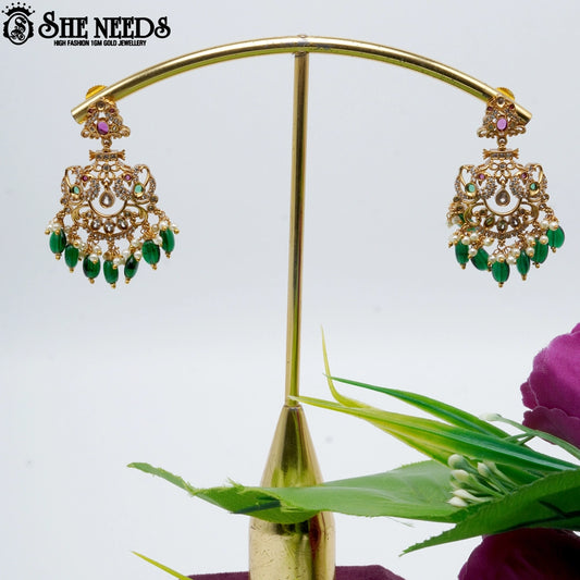 “Matte gold Chandbali earrings with pearl drops and green bead accents – SheNeeds Jewellery