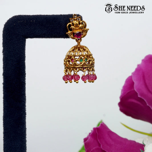 Traditional gold plated South Indian jhumka earrings with pink beads and temple jewellery stone detailing