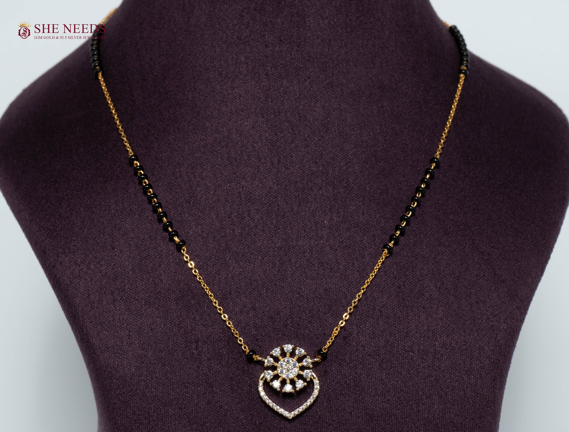 Aadhira Heart Bloom American Diamond Mangalsutra Necklace with Floral Heart CZ Pendant and Black Beads in Gold Plated Finish