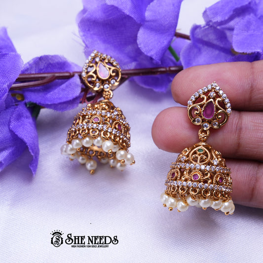 Antique gold jhumka earrings with CZ stones and white bead drops traditional ethnic jewellery by She Needs Jewellery