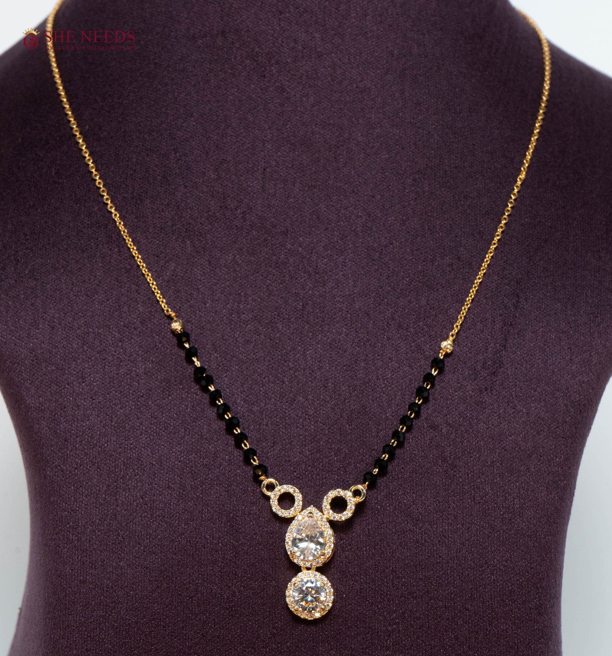 Aarini American Diamond Mangalsutra with Double Drop CZ Pendant and Black Beads in Gold Plated Finish