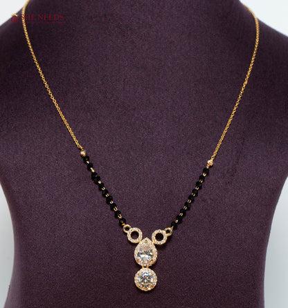 Aarini American Diamond Mangalsutra with Double Drop CZ Pendant and Black Beads in Gold Plated Finish