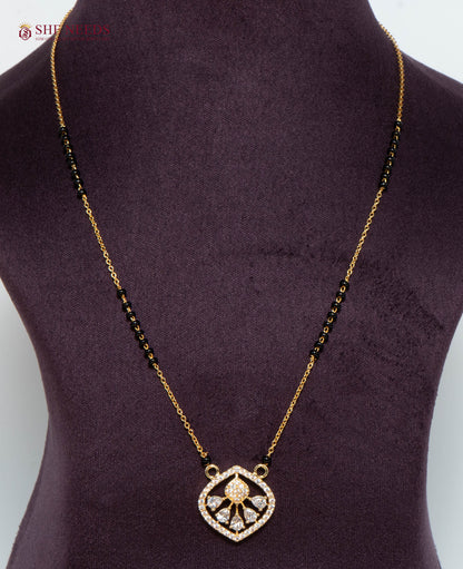 Aarini Bloom American Diamond Mangalsutra Necklace with Floral Heart CZ Pendant and Black Beads in Gold Plated Finish