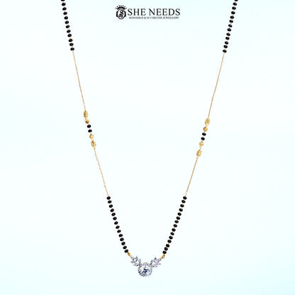 Full view of Aarini Gold Plated Halo American Diamond Mangalsutra with a round halo-style CZ pendant, elegant floral accents, and a traditional black bead chain. | She Needs Jewellery