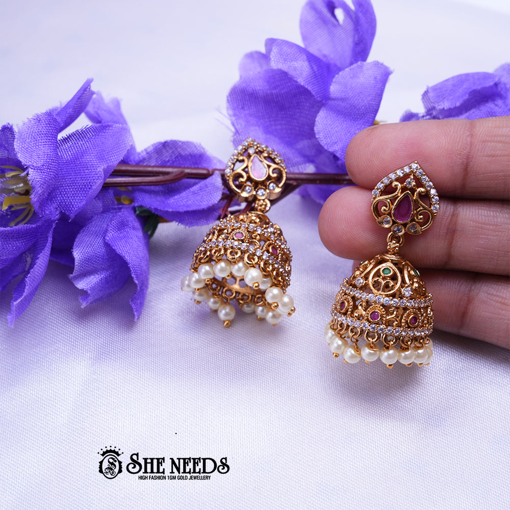 Antique gold jhumka earrings with CZ stones and white bead drops traditional ethnic jewellery by She Needs Jewellery