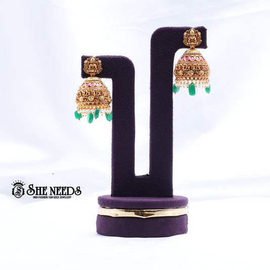 Antique Gold Lakshmi Temple Jhumka Earrings with Green Beads and AD Stones | She Needs Jewellery