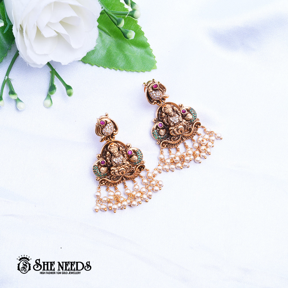 Antique Lakshmi Pearl Jhumka Earrings with temple motifs and pearl hangings