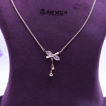 Rose gold Crystal Petal pendant chain featuring marquise-cut crystal stones in a floral design with delicate dangling accents on a fine chain, displayed on a purple jewelry bust |She Needs Jewellery
