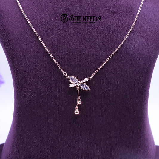 Rose gold Crystal Petal pendant chain featuring marquise-cut crystal stones in a floral design with delicate dangling accents on a fine chain, displayed on a purple jewelry bust |She Needs Jewellery

