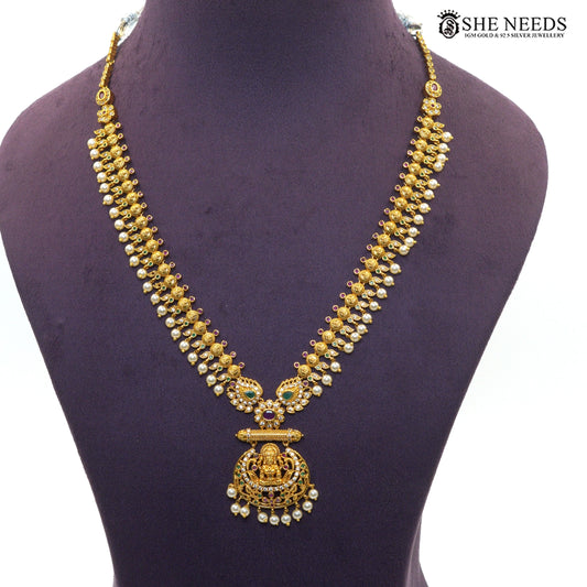Long double layer antique gold temple necklace with Lakshmi pendant and pearl drops|She Needs Jewellery