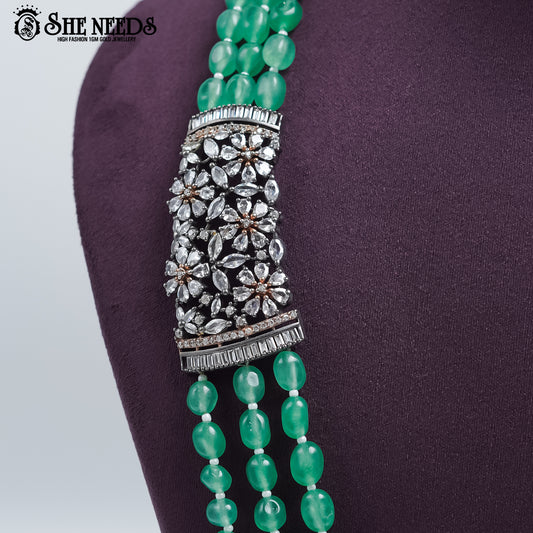 Emerald Bloom Antique Beaded Necklace with layered green beads and antique silver detailing
