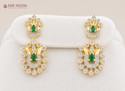 Elegant emerald green AD stone choker necklace set with matching designer earrings in premium gold finish displayed on white mannequin.