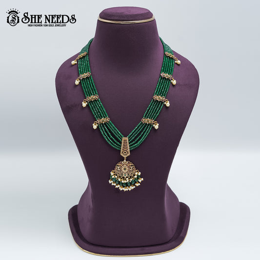 Emerald green beaded haram set with antique pendant and matching earrings