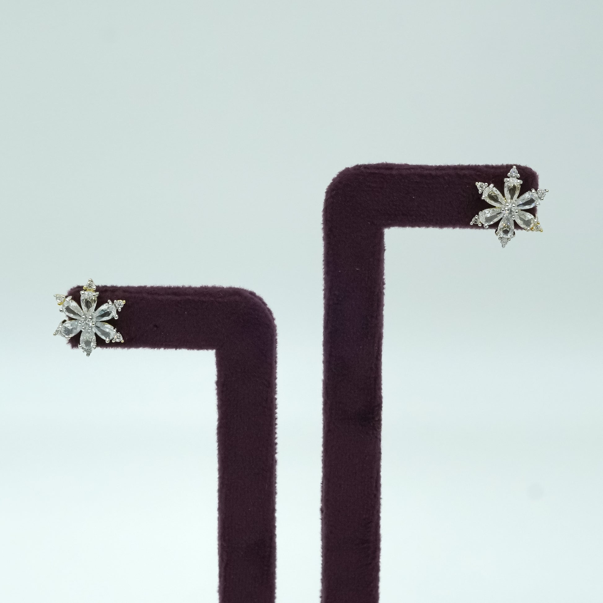 White gold plated floral stud earrings with sparkling white zircon stones for women |She Needs Jewellery