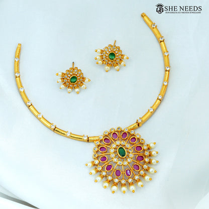 Gold-plated Kantey short necklace set with green stone ruby accents, AD stones and matching pearl drop earrings|She Needs Jewellery
