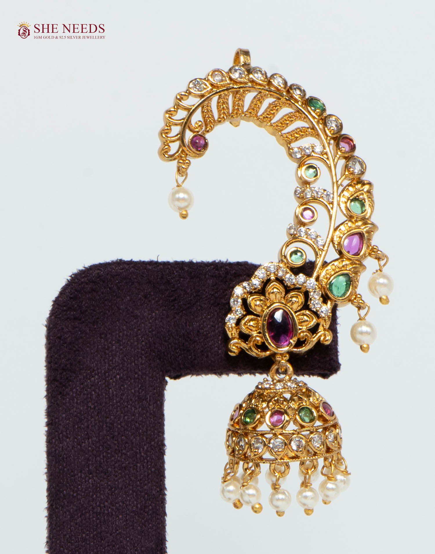 Gold multicolor floral ear cuff jhumka earring with sparkling American Diamonds, multicolor stones, intricate floral detailing, and pearl drop danglers for bridal and festive wear.|She Needs Jewellery

