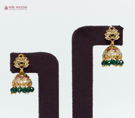 Gold Plated Floral Jhumka Earrings with American Diamonds, Emerald Green Stones and Green Crystal Beads | She Needs Jewellery