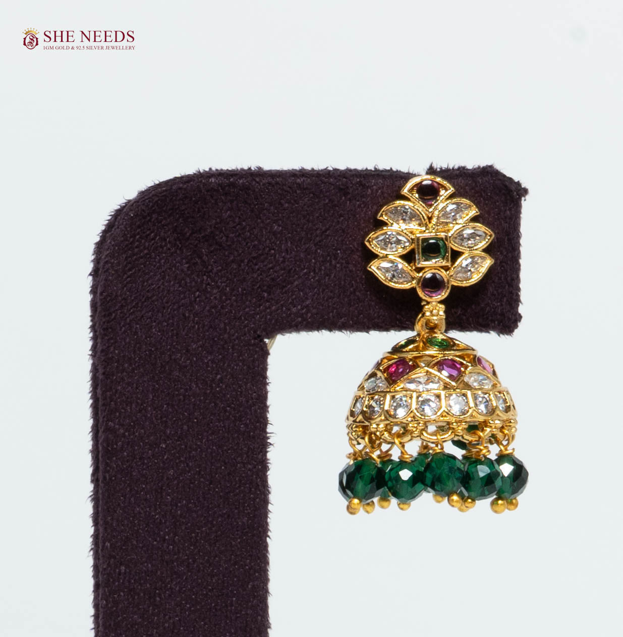 Gold Plated Floral Jhumka Earrings with American Diamonds, Emerald Green Stones and Green Crystal Beads | She Needs Jewellery