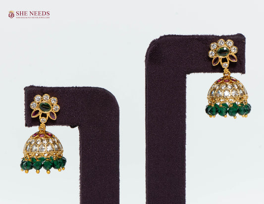 Gold Plated Floral Kundan Jhumka Earrings with American Diamonds, Emerald Green Crystal Beads and Ruby Accents | She Needs Jewellery