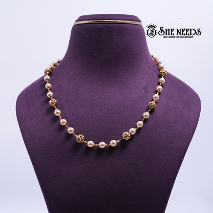 Golden Pearl Radiance Necklace featuring pearl beads, textured gold beads, and a premium gold finish | She Needs Jewellery