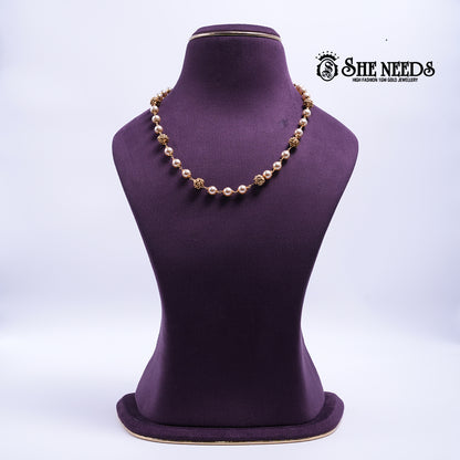 Golden Pearl Radiance Necklace featuring pearl beads, textured gold beads, and a premium gold finish | She Needs Jewellery