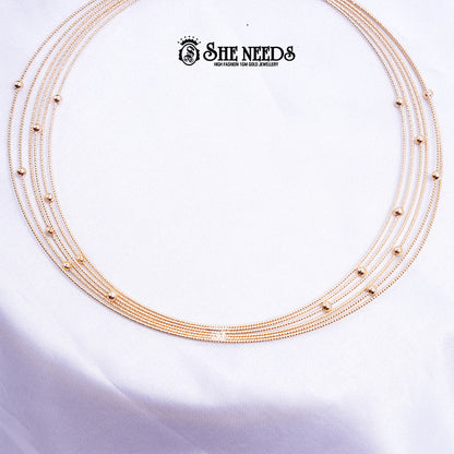 Hasli Multi Layer Chain Necklace  Shop elegant rose gold multi layer chain necklace for women. Lightweight and stylish jewellery perfect for daily wear, parties, and festive looks.